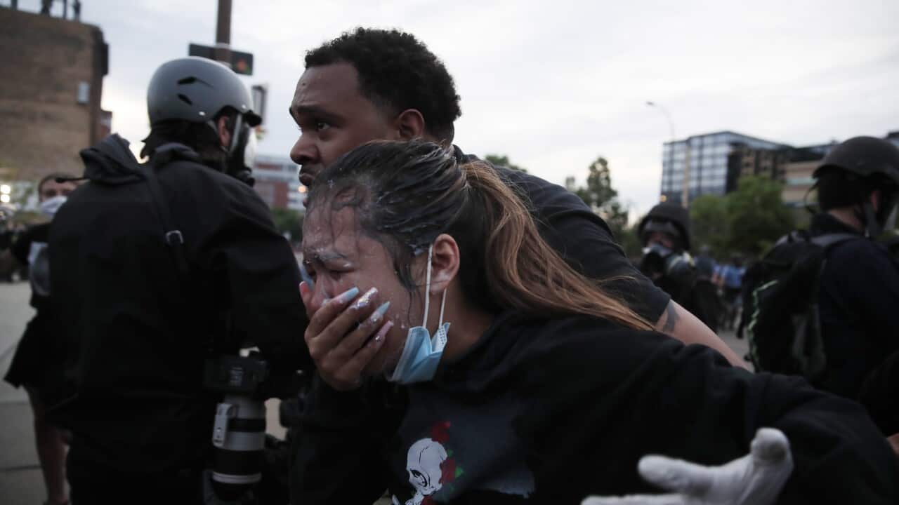 epa08456981 Protesters face off against police during the sixth day of protests over the arrest of George Floyd, who later died in police custody, in Minneapolis, Minnesota, USA, 31 May 2020. A bystander's video posted online on 25 May, appeared to show G