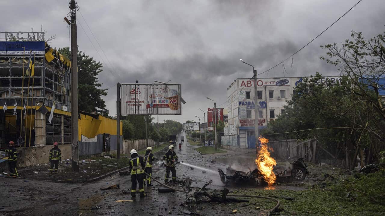 Firefighters extinguish a fire