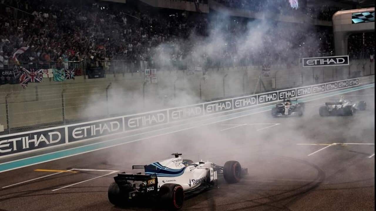 Felipe Massa performs a donut at the end of the race.