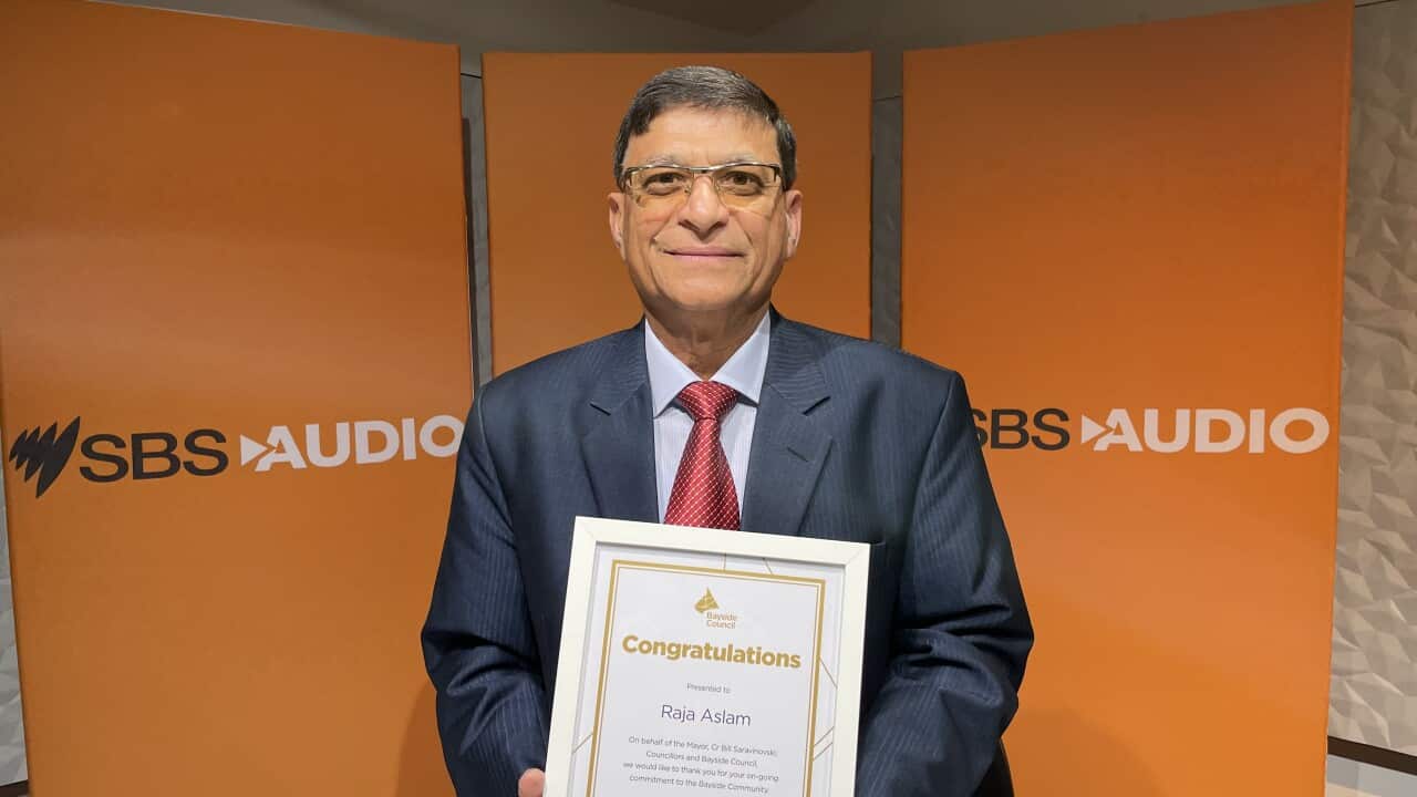 Raja Aslam with his award.jpg