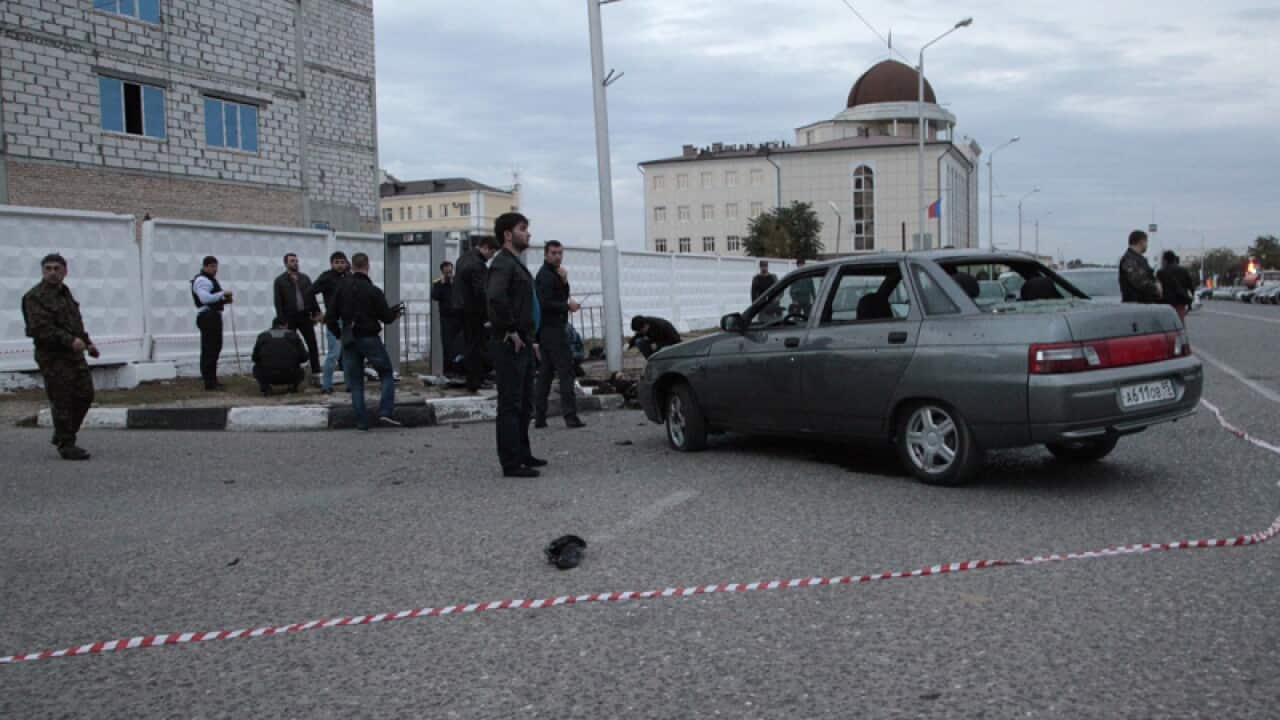 Police cordon off the scene of an explosion in Chechnya