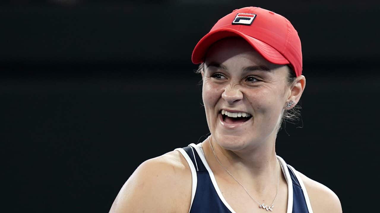 Ash Barty smiles during a doubles final match at the Brisbane International tennis tournament in January 2020.