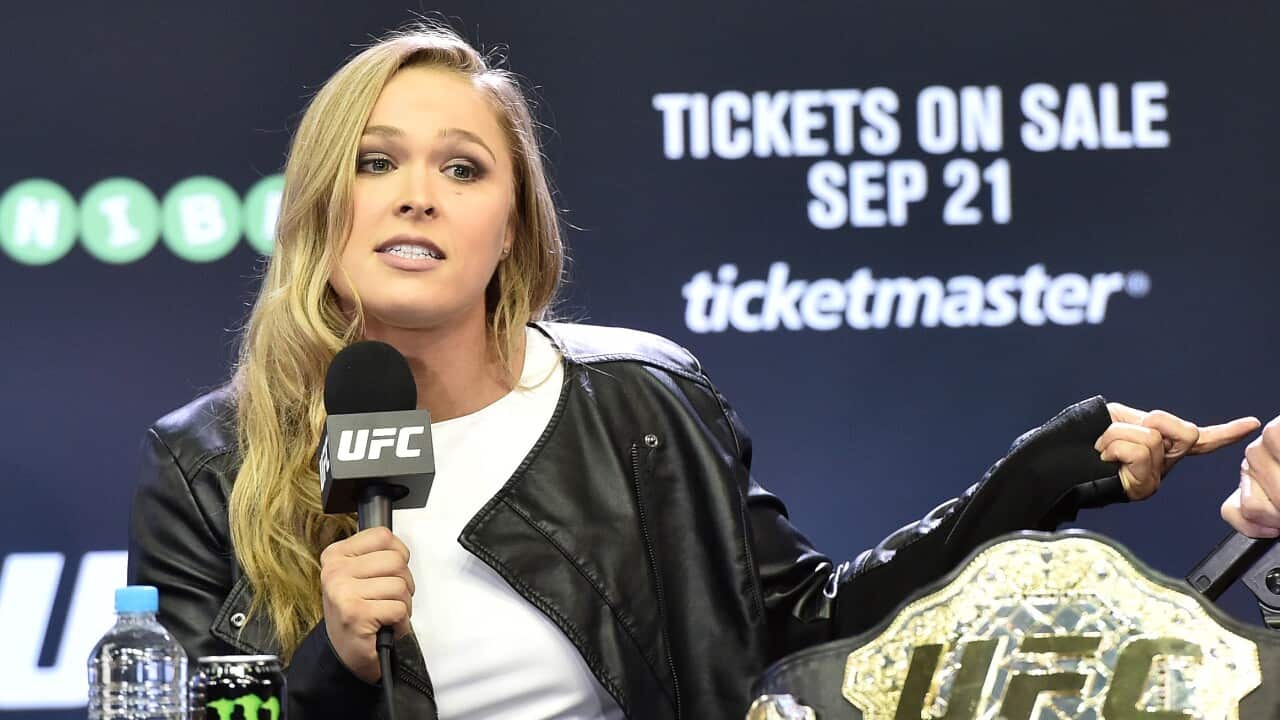 FC bantamweight champion Ronda Rousey takes questions from journalists at Etihad Stadium in Melbourne