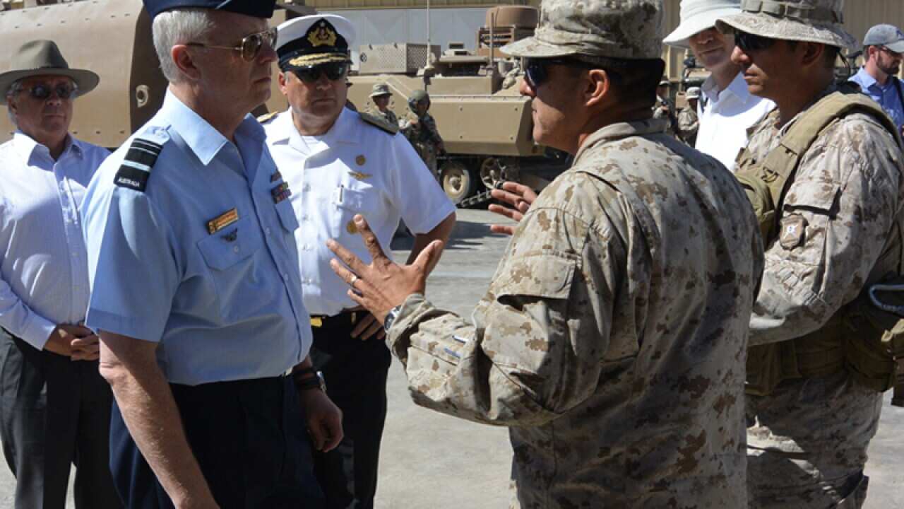 Defence vice chief Air Marshal Mark Binksin (L) in Chile.