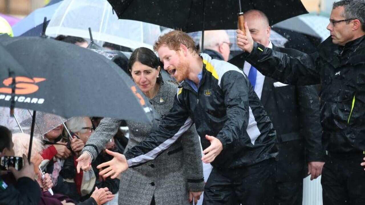Prince Harry with Gladys Berejiklian during his last visit to Sydney.