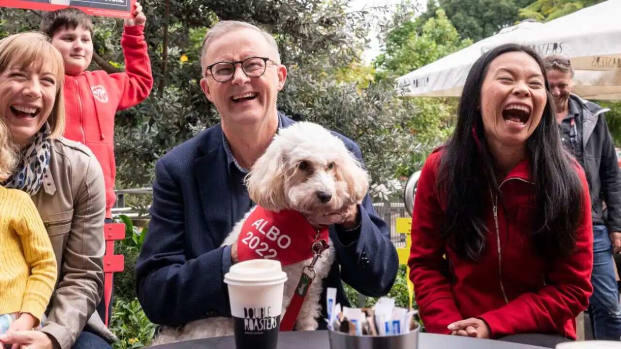 Anthony Albanese (C) meets with Labor candidate for Reid, Sally Sitou (R) and supporters after winning the federal election at Marrickville Library and Pavilion