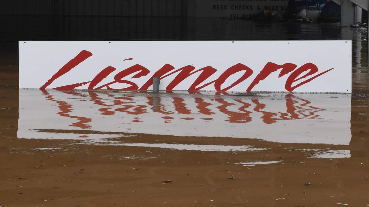 A submerged Lismore sign is seen in central Lismore, NSW, during the 2017 floods