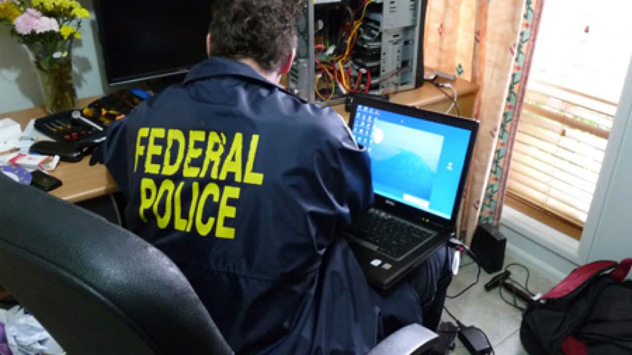 afp_computer_raids_101201_B_aap_1948296586
