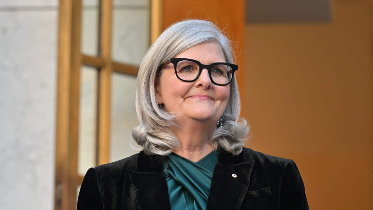 Sam Mostyn at Parliament House is pictured looking into the distance.