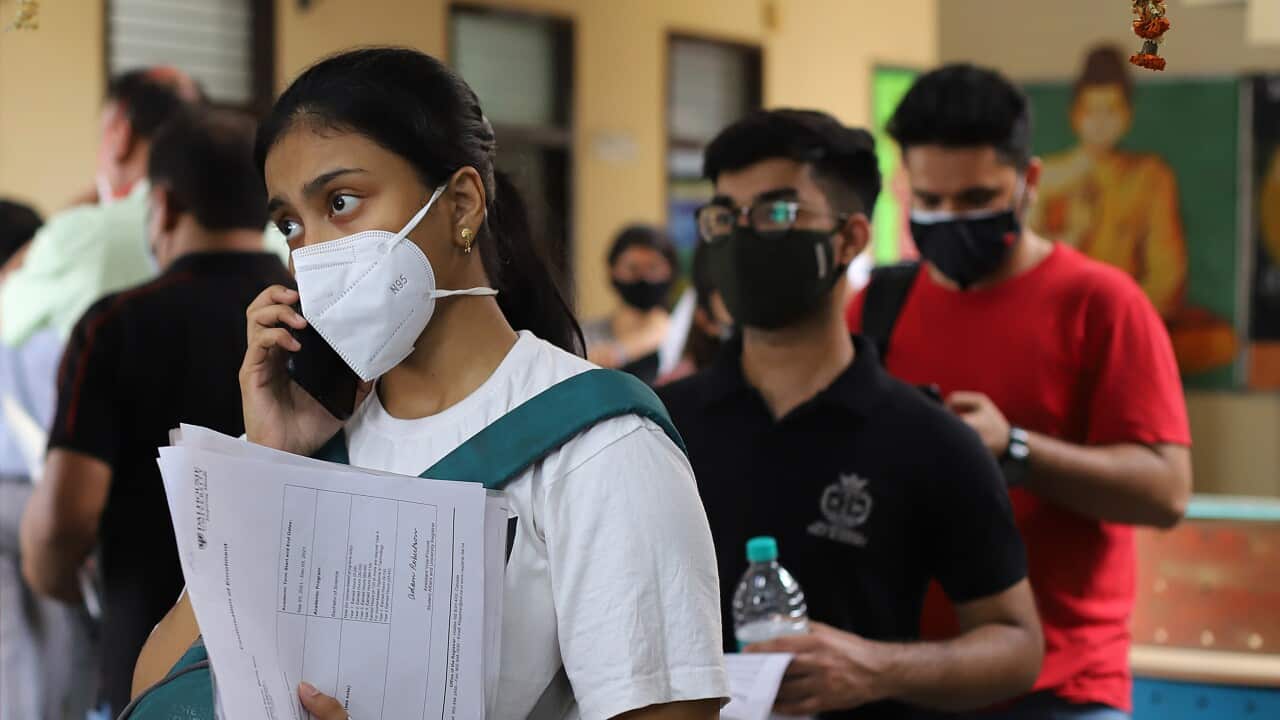 Students and international travelers completing paperwork before being vaccinated against the Covid-19 coronavirus at a dedicated vaccination centre for international travelers, in Delhi. (Photo by Amarjeet Kumar Singh / SOPA Images/Sipa USA)