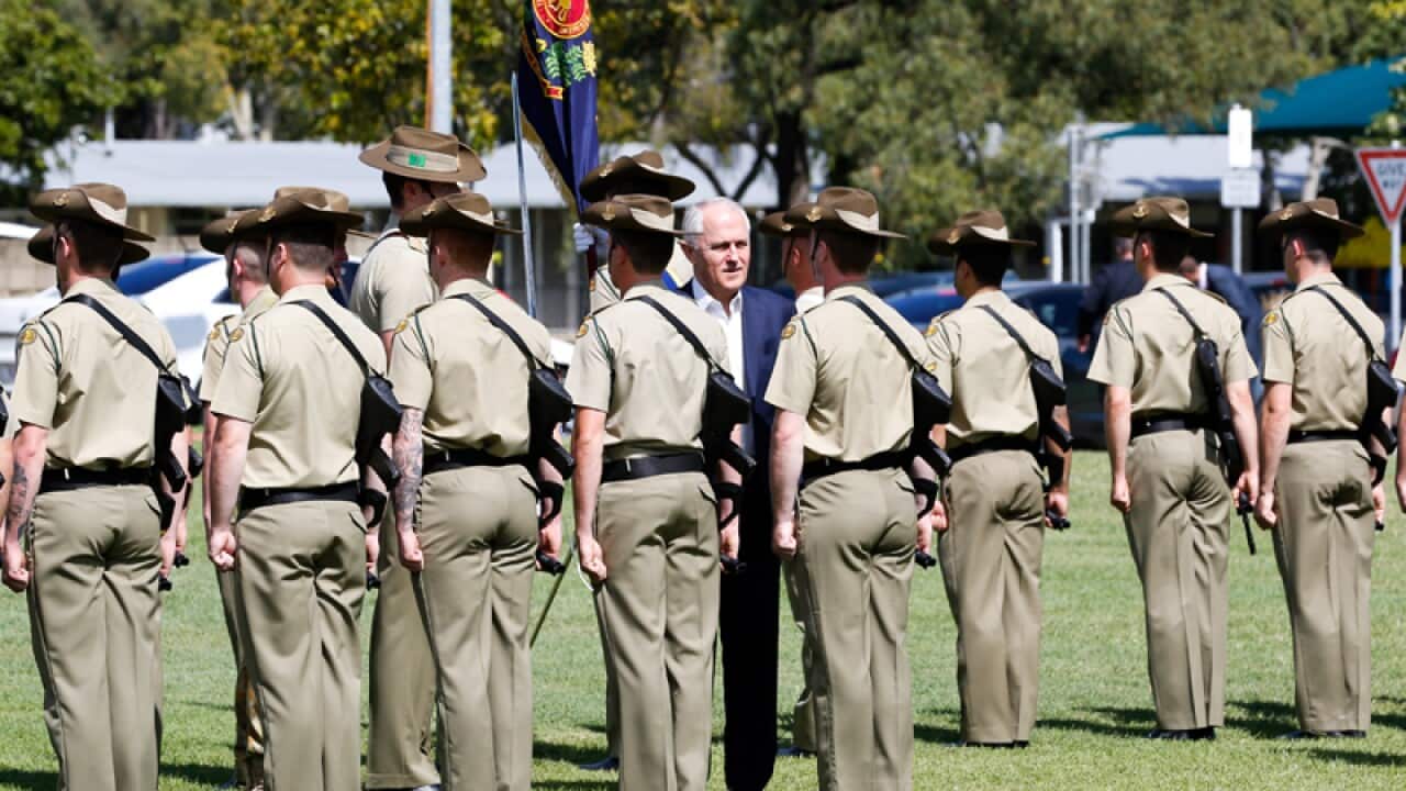 Prime Minister Malcolm Turnbull inspects troops in Townsville