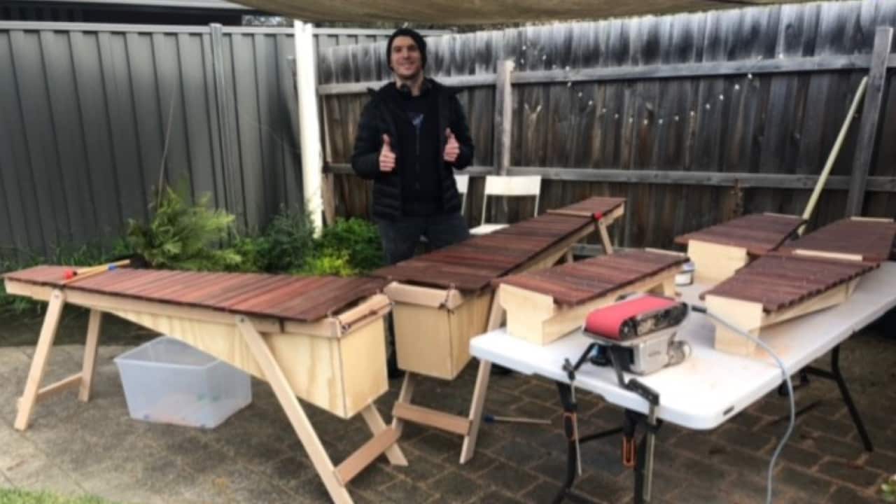Primary teacher Jorge Leiva teaches students in Melbourne to build marimbas and play them