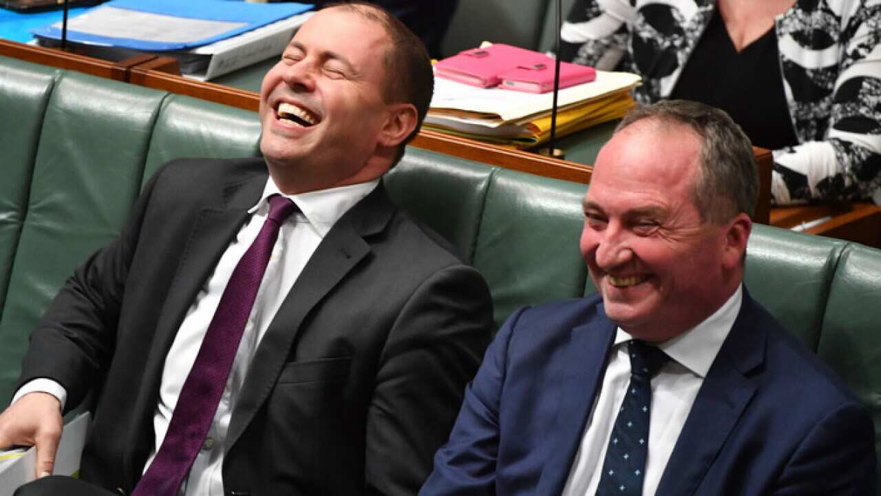 Minister for Energy Josh Frydenberg and Deputy Prime Minister Barnaby Joyce during Question Time in the House of Representatives at Parliament House in Canberra, Tuesday, October 24, 2017. (AAP Image/Mick Tsikas) NO ARCHIVING