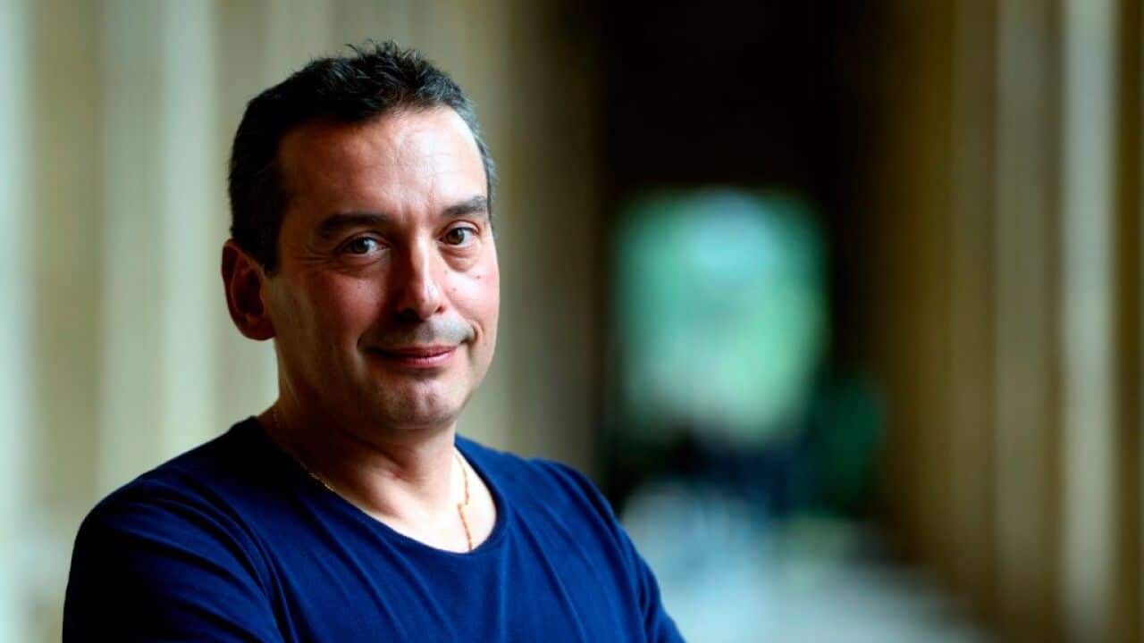 Christos Tsiolkas in a blue shirt