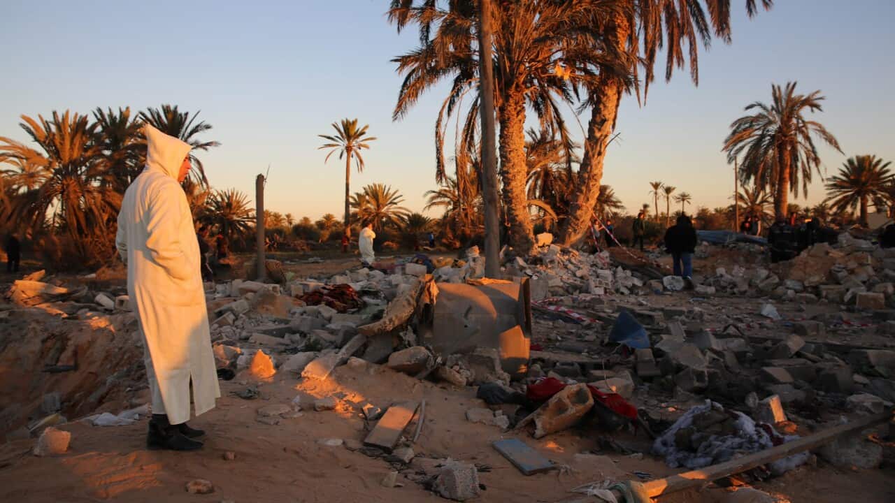 A view shows damage at the scene after the airstrike