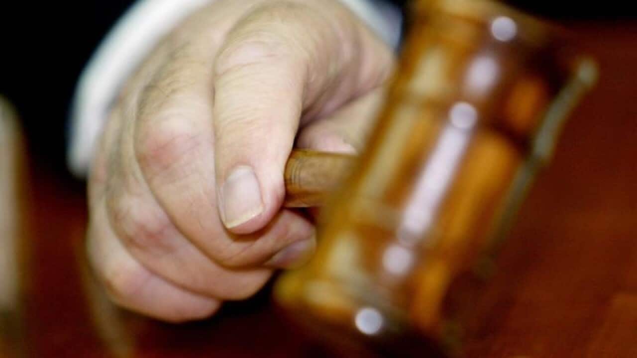 Judge holds a gavel