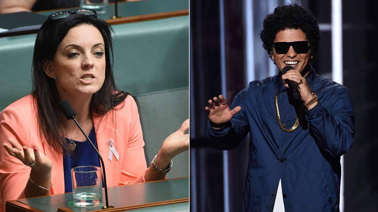 Labor's Emma Husar has defended a trip to Queensland during where she attended a Bruno Mars conce