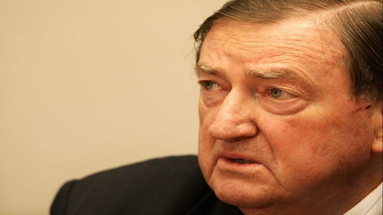 Former High Court Judge Ian Callinan speaking to the media.