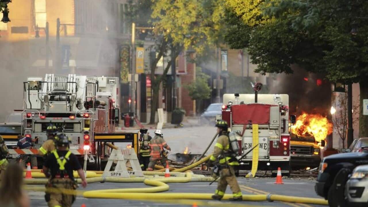 Firefighters work the scene of an explosion in downtown Sun Prairie.