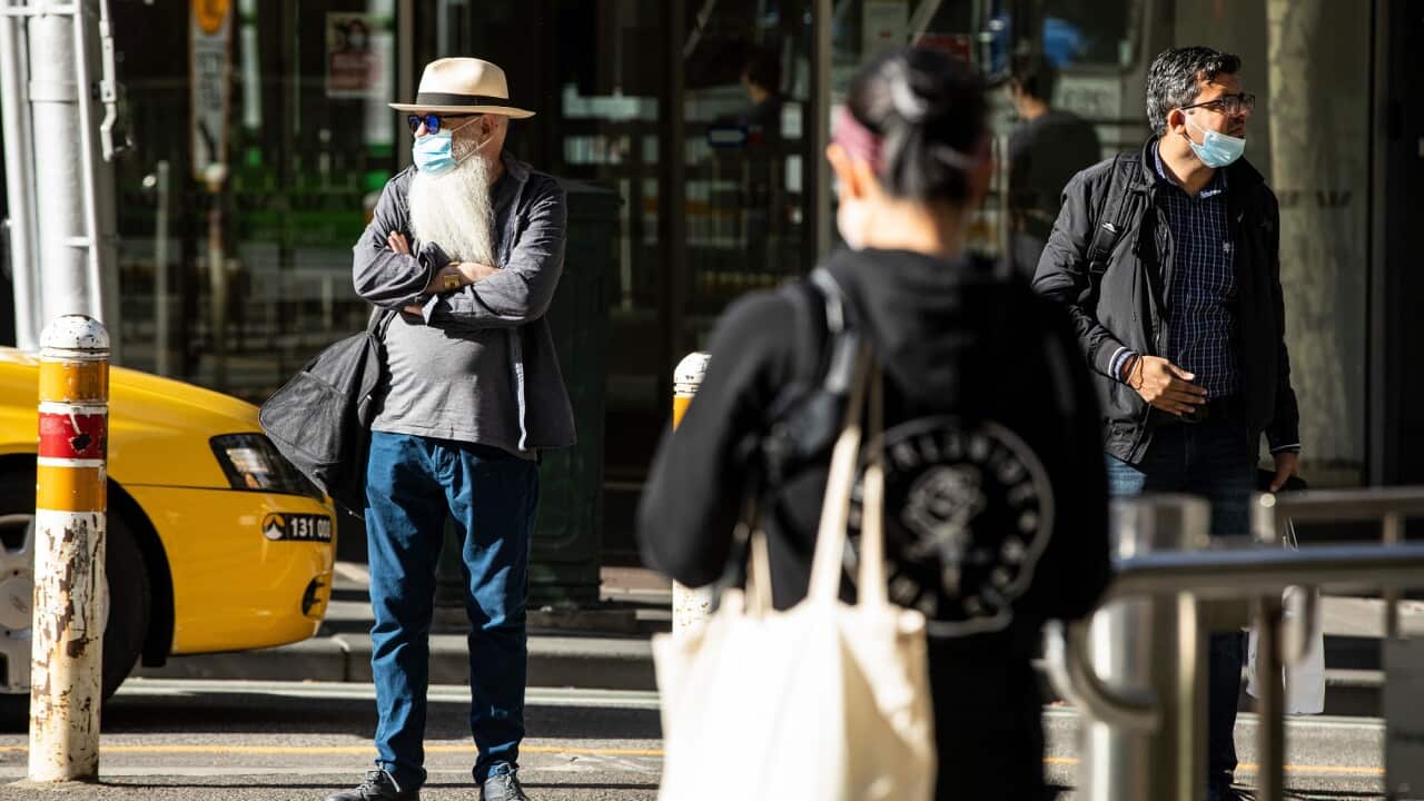 Residents in Melbourne wear face masks.