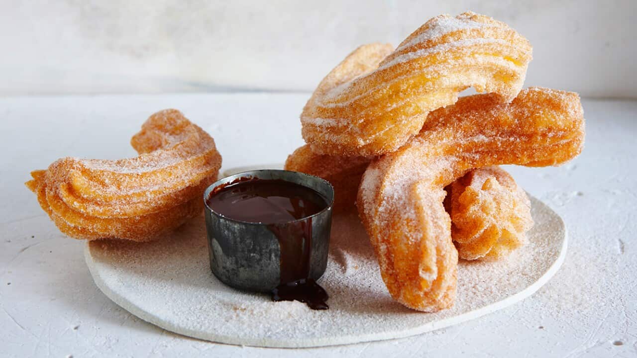 Cinnamon sugar churros with a bitter sweet chocolate sauce