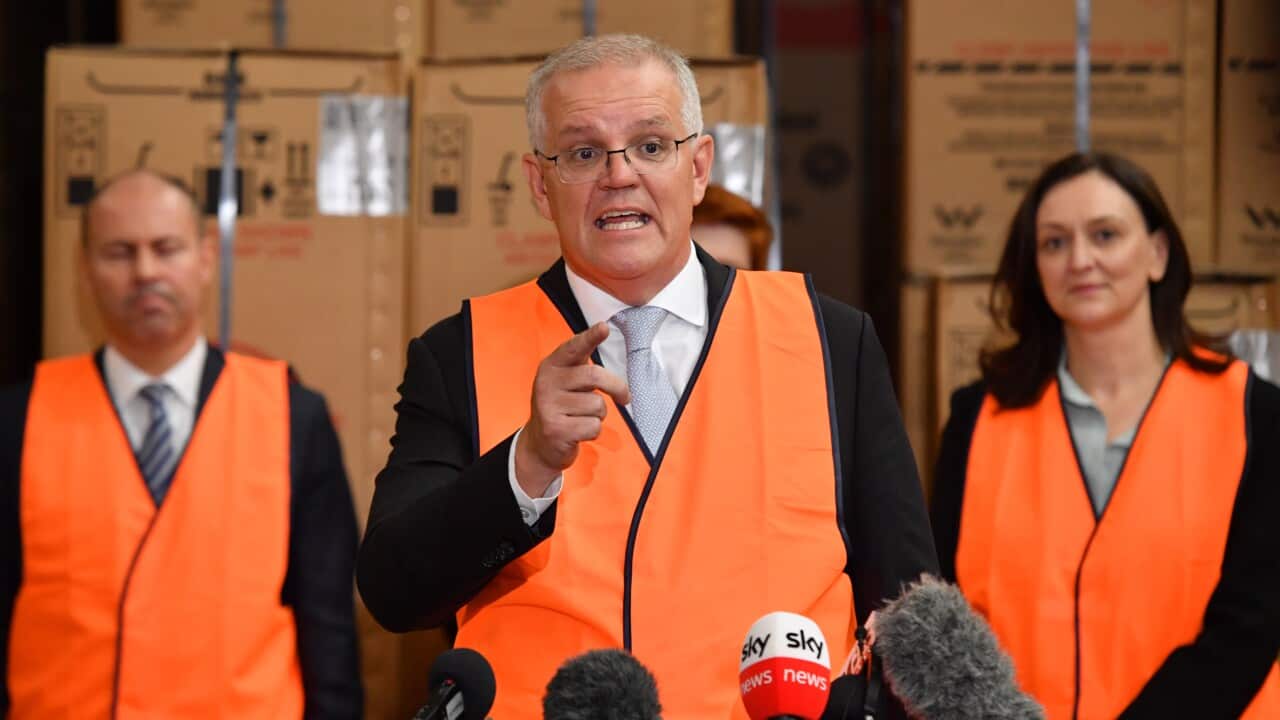 Prime Minister Scott Morrison at a press conference in Parramatta in Sydney with Treasurer Josh Fryenberg and Paramatta candidate Maria Kovacic.