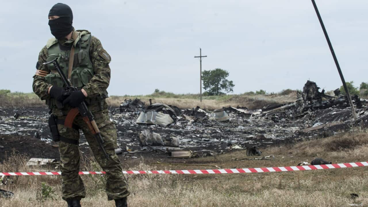 pro-Russian fighter guarding the crash site of Mh17
