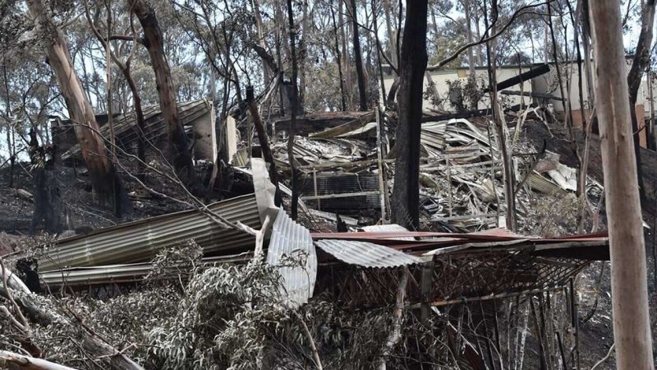 Fire damaged buildings at Wye River.