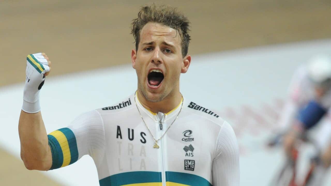 Australia's Samuel Welsford celebrates after winning the Men's Scratch Race at the UCI Track Cycling World Championships in Poland. (Getty)