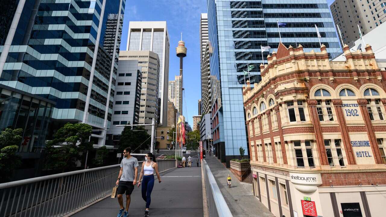 People walking in a quiet part of the CBD, in Sydney.