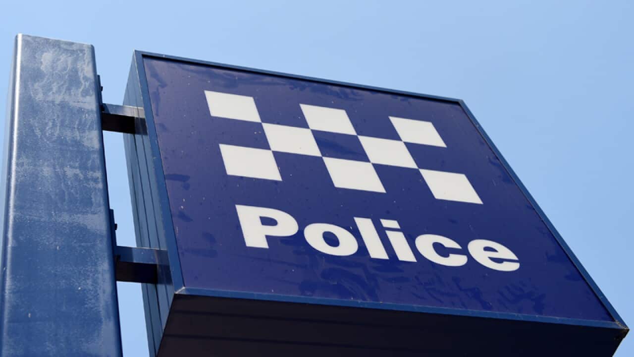 A police station sign