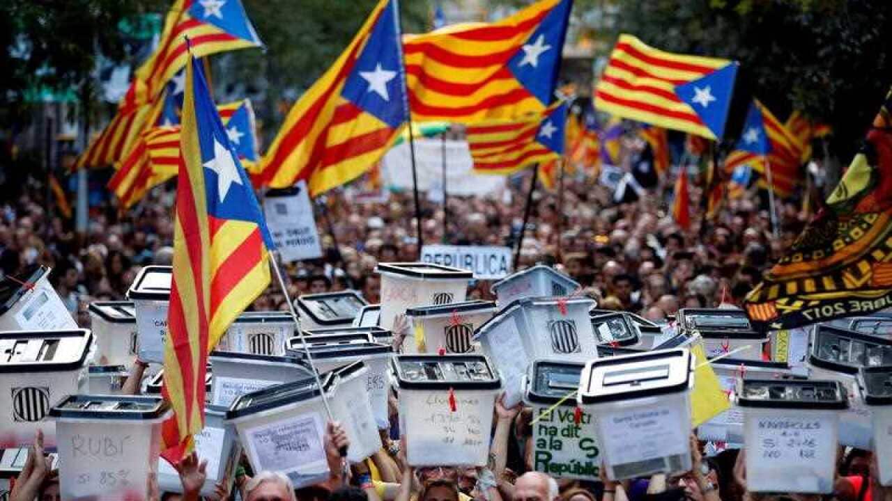 Thousands of people attend a protest on the occasion of the first anniversary of the Catalan illegal independence referendum held back 01 October 2017, in Barcelona, Spain, 01 October 2018.