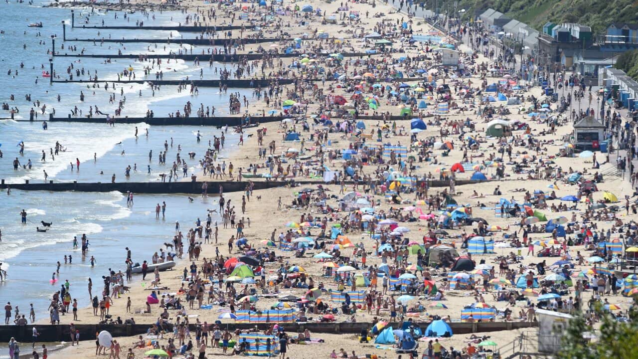 Tourists enjoy the hot weather at Bournemouth beach on May 25, 2020 in Bournemouth, United Kingdom.