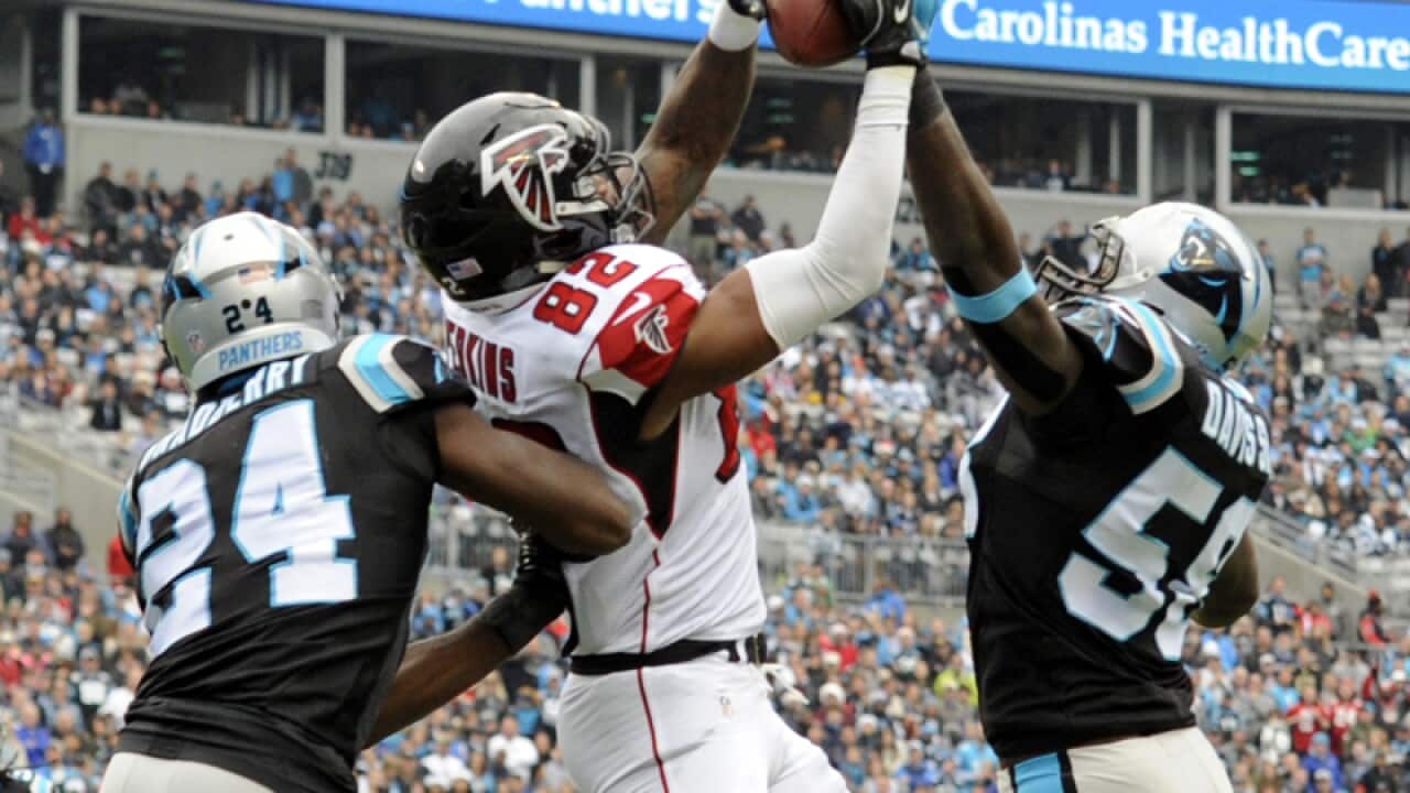 Atlanta Falcons' Josh Perkins catches a touchdown pass