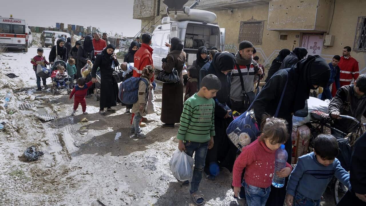 Syrian civilians leave the rebels-held Eastern Ghouta via the al-Wafideen safe corridor.