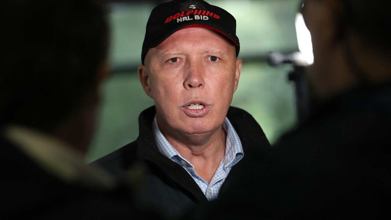Federal Defence Minister Peter Dutton is seen on Federal Election day, in the seat of Dickson in Brisbane, Saturday, May 21, 2022. More than 17 million Australians will vote to elect the next federal government. (AAP Image/Jono Searle) NO ARCHIVING