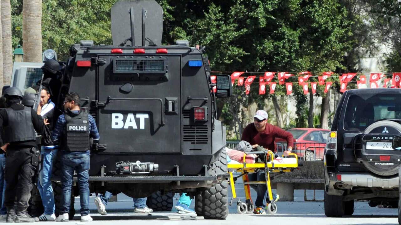 One of those injured when gunmen targeting tourists opened fire is evacuated from the National Bardo Museum, Tunis, Tunisia, 18 March 2015. (EPA/STR)