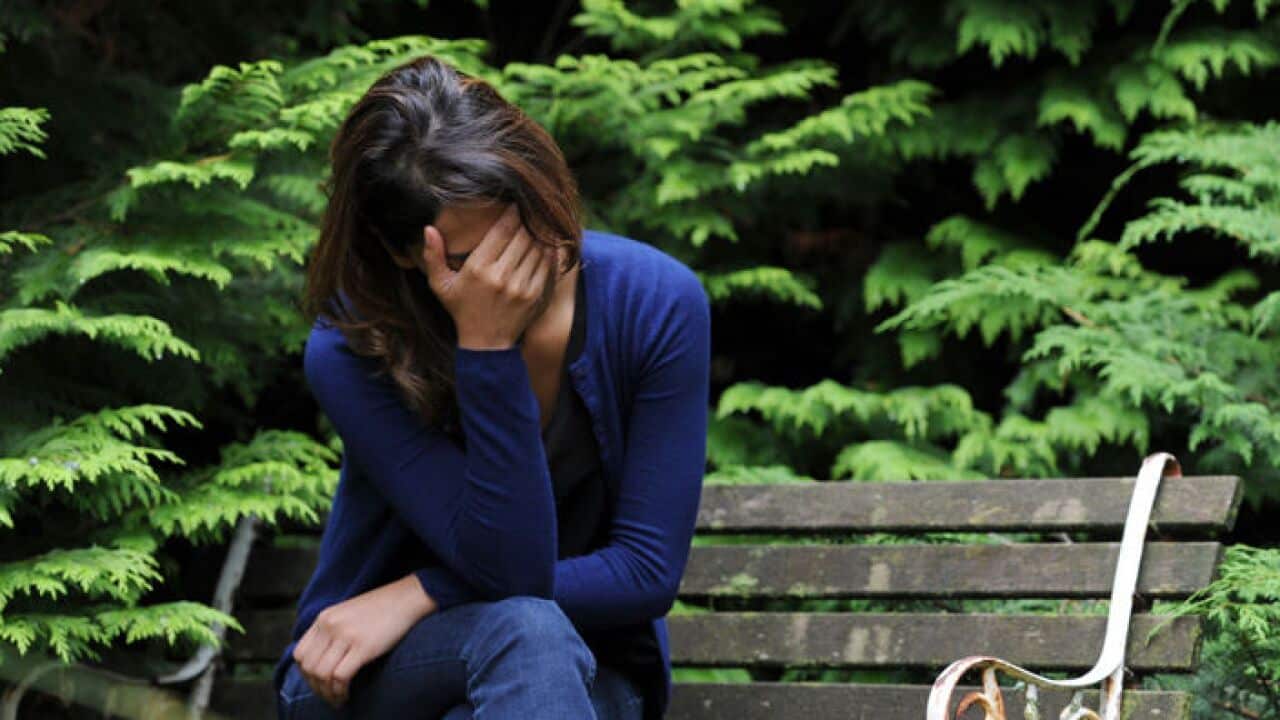 A woman showing signs of depression.