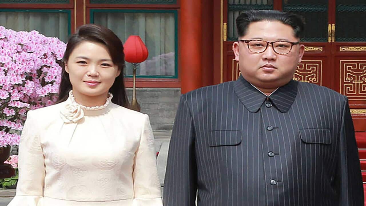 North Korean leader Kim Jong Un and his wife Ri Sol Ju posing for a picture in Beijing.