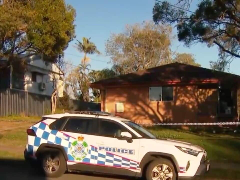 Queensland Police vehicle parked outside a home following the death of a 27-year-old woman at Rowanda Street in Slacks Creek, Queensland, on Wednesday, August 12, 2026.
