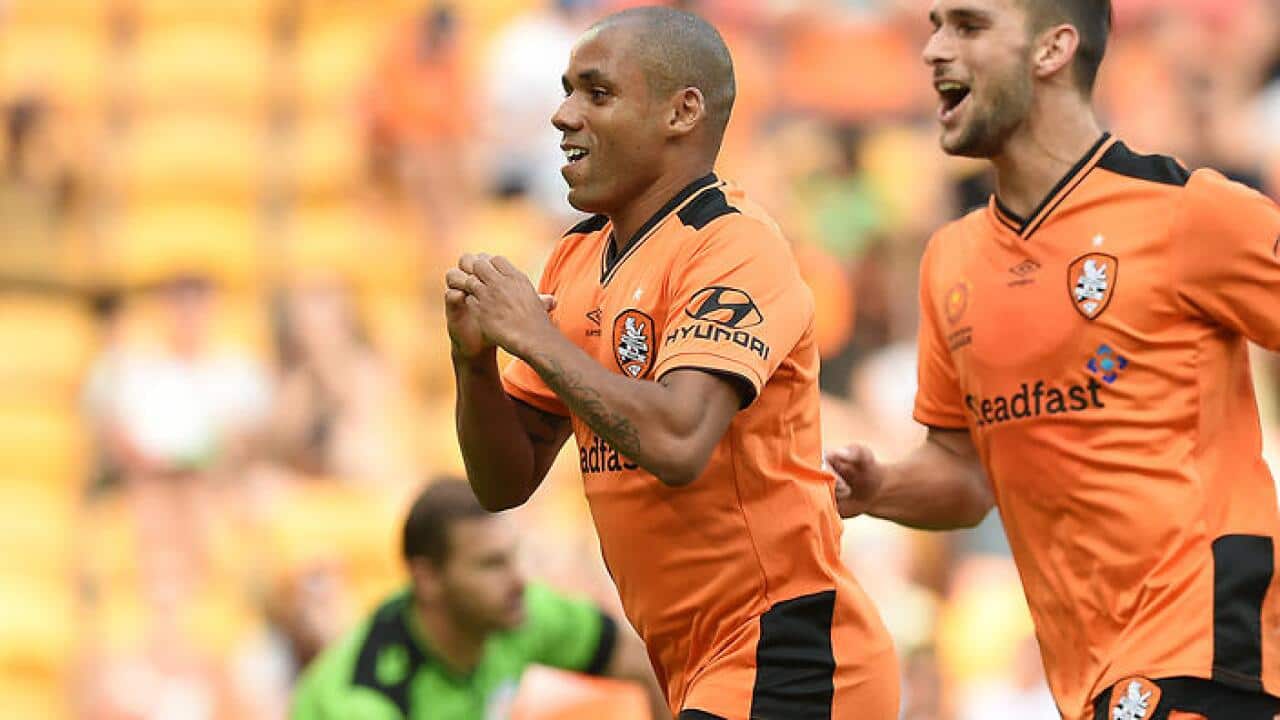 Roar player Henrique (left) celebrates after scoring a goal during the round 13 A-League match between the Brisbane Roar and Perth Glory at Suncorp Stadium in Brisbane, Saturday, Jan. 02, 2016. (AAP Image/Dave Hunt) NO ARCHIVING,