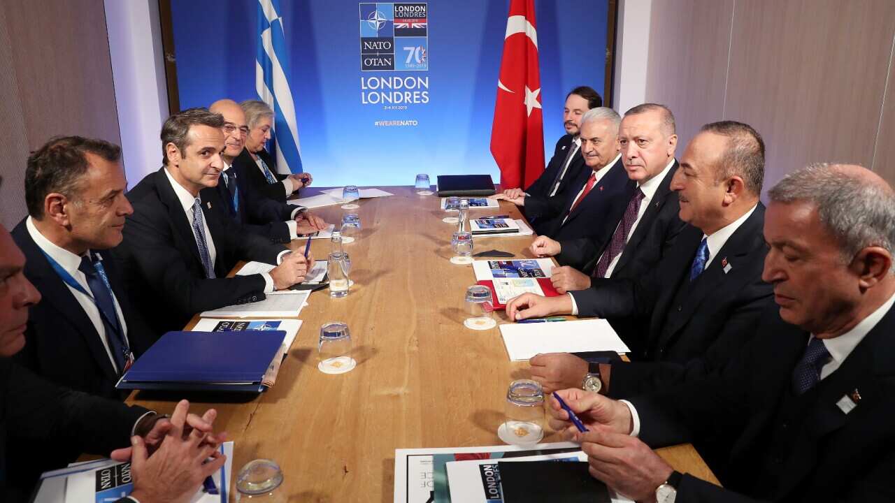 Turkish President Recep Tayyip Erdogan meets with Greek Prime Minister Kyriakos Mitsotakis within the NATO Leaders' Summit, on December 4, 2019.