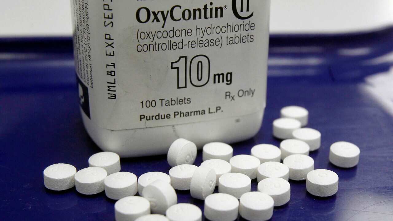 OxyContin (Oxycodone) pills and container
