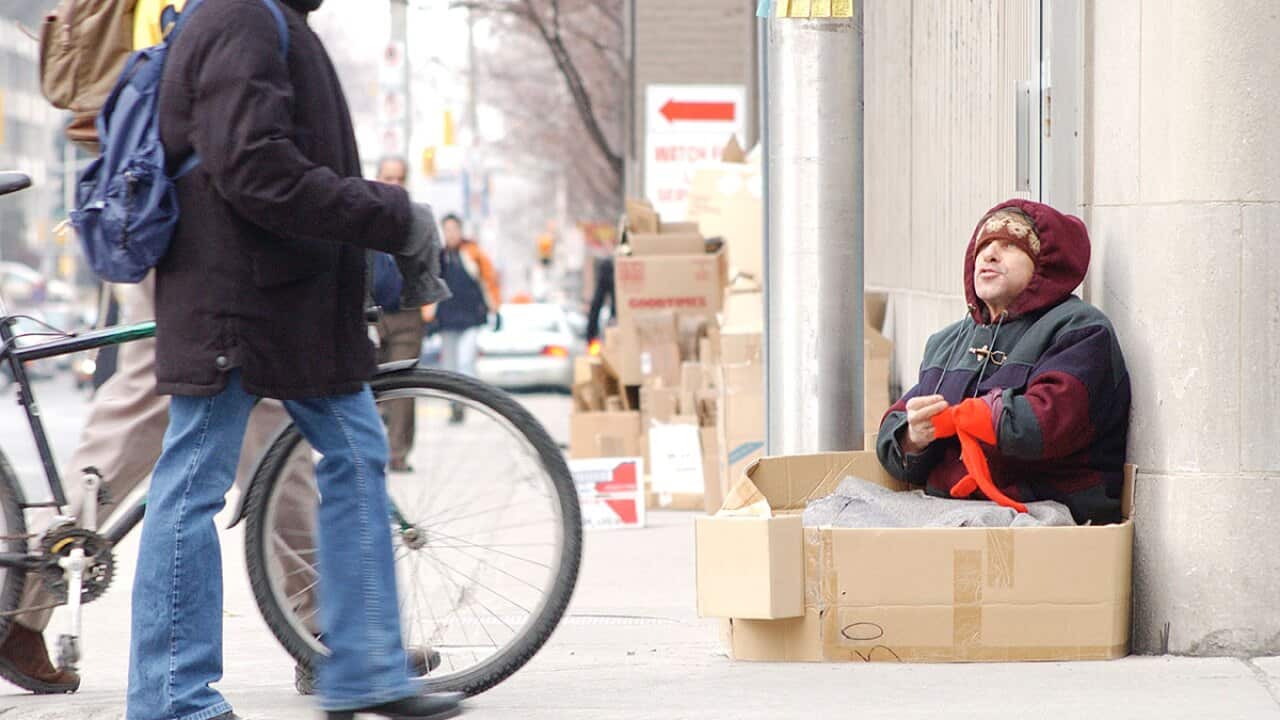 Homeless man on street