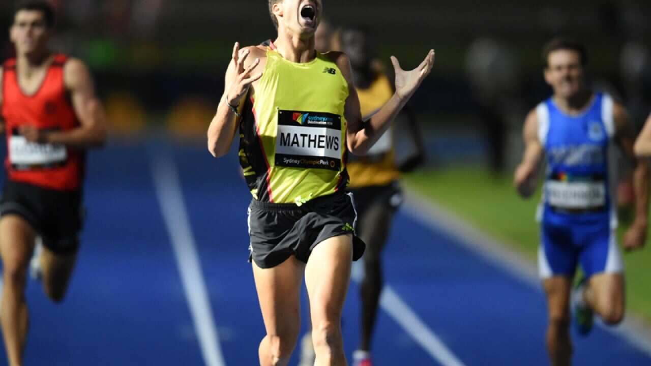 Luke Mathews wins the Mens 800 Metre Open