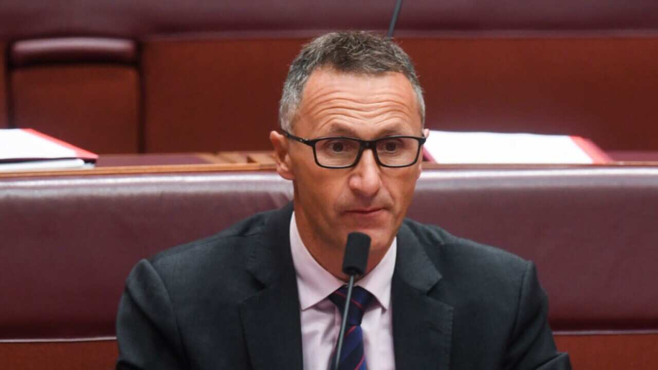 The leader of the Australian Greens Senator Richard Di Natale reacts during Question Time in the Senate chamber in Canberra, Monday, March 19, 2018