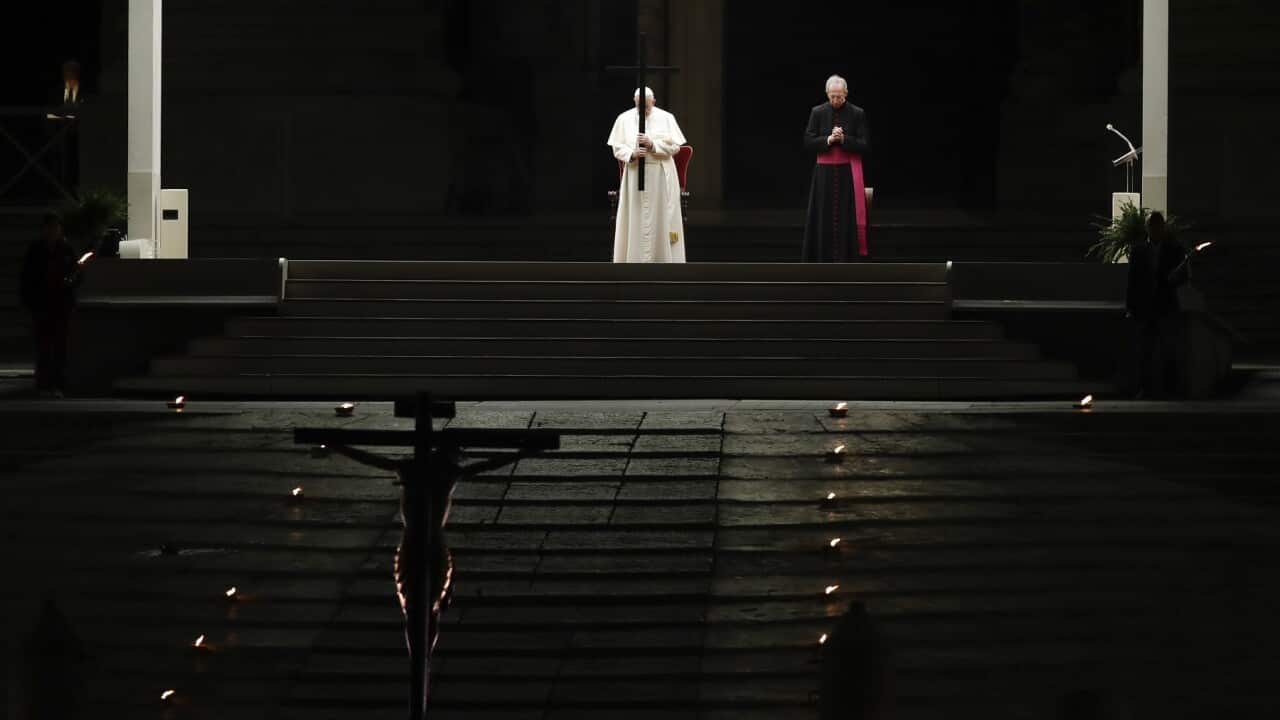 Pope Francis presides over the Via Crucis ceremony in an empty St Peter's Square