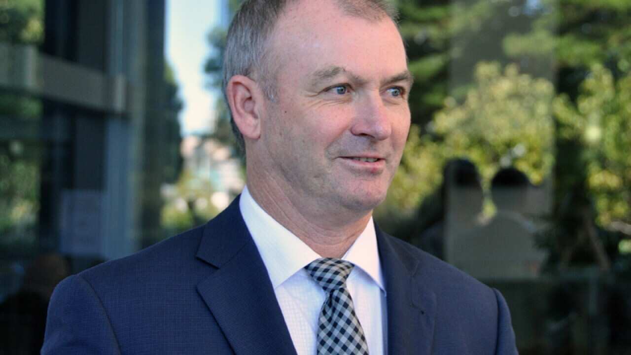 WA Health Minister Kim Hames speaks to the media in Perth