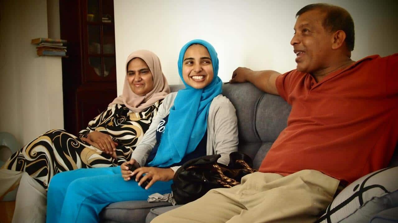 Sabina and her parents