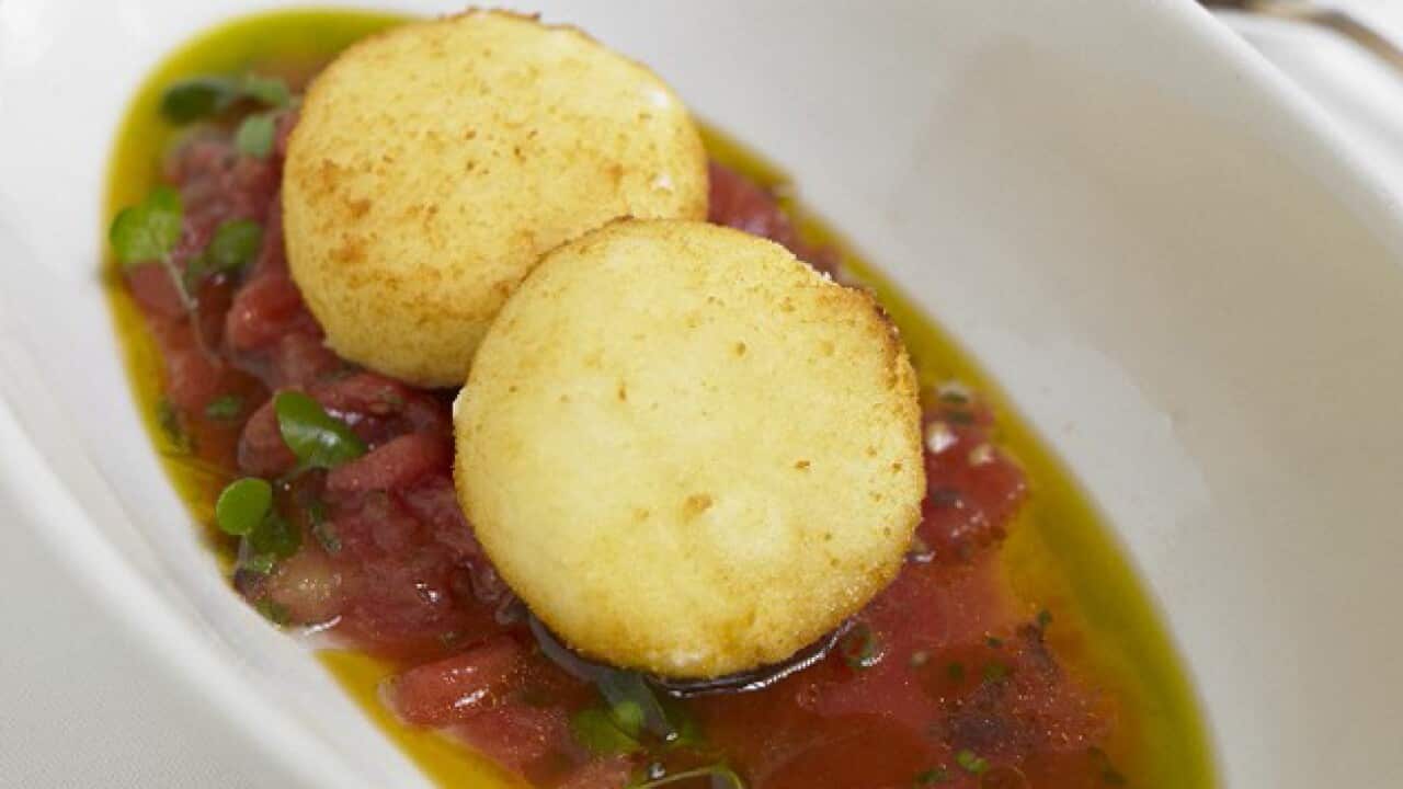 StockFood_11113512 - Fried risotto cakes in tomato and olive oil_342752896
